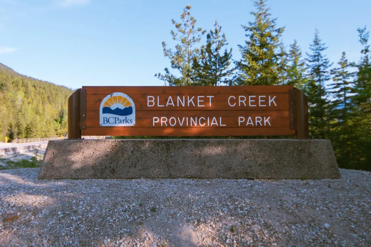 Wooden sign that says Blanket Creek Provincial Park.