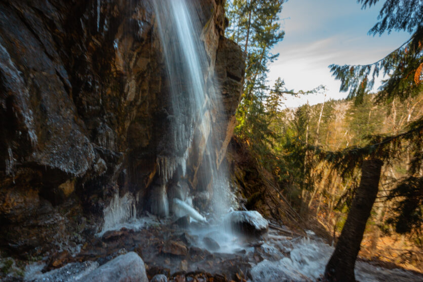 Small waterfall with some ice at the base.