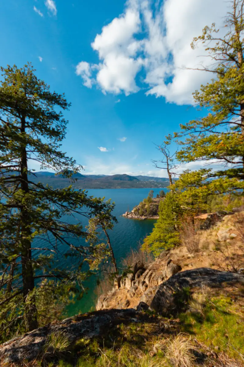 View of Okanagan Lake from the top of a rocky headland at Ellison Provincial park. Sunny, bright spring day