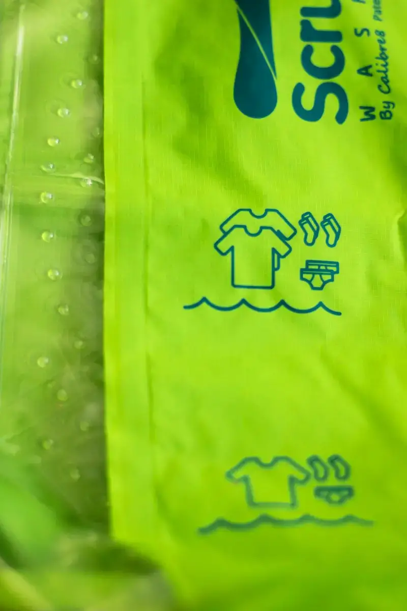 Close up of water level indicator on the side of the Scrubba laundry bag.