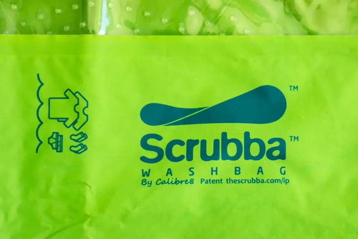 Close up of the side of the Scrubba portable laundry bag. Logo is clearly visible.