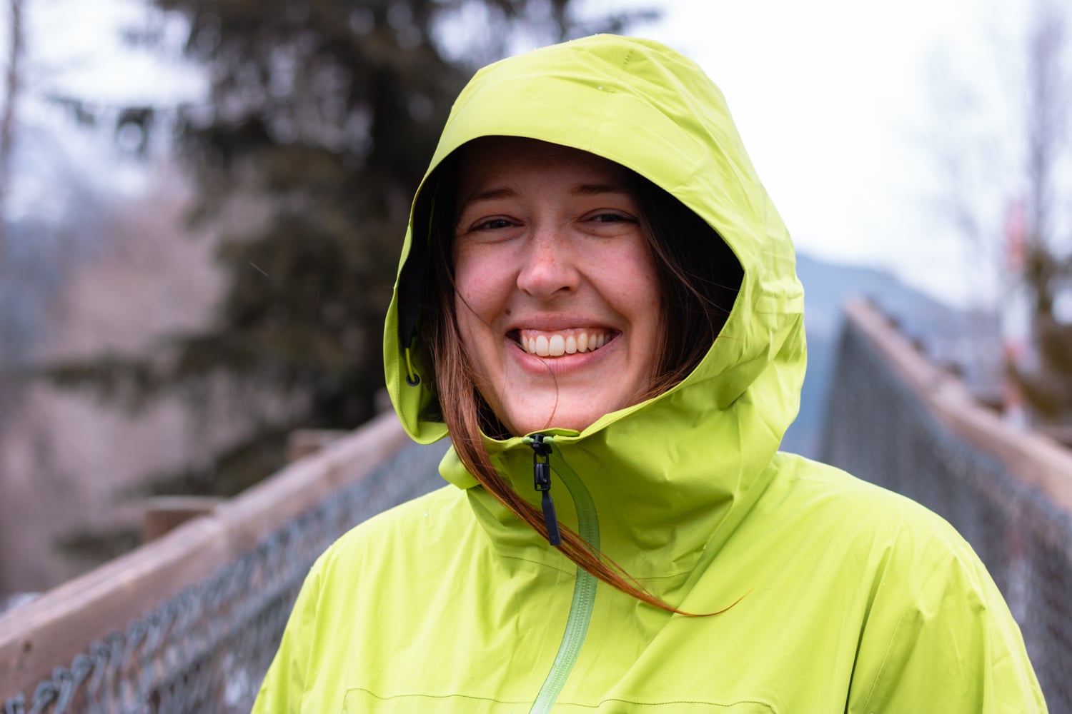 Woman wearing the women's Black Diamond StormLine stretch rain jacket.