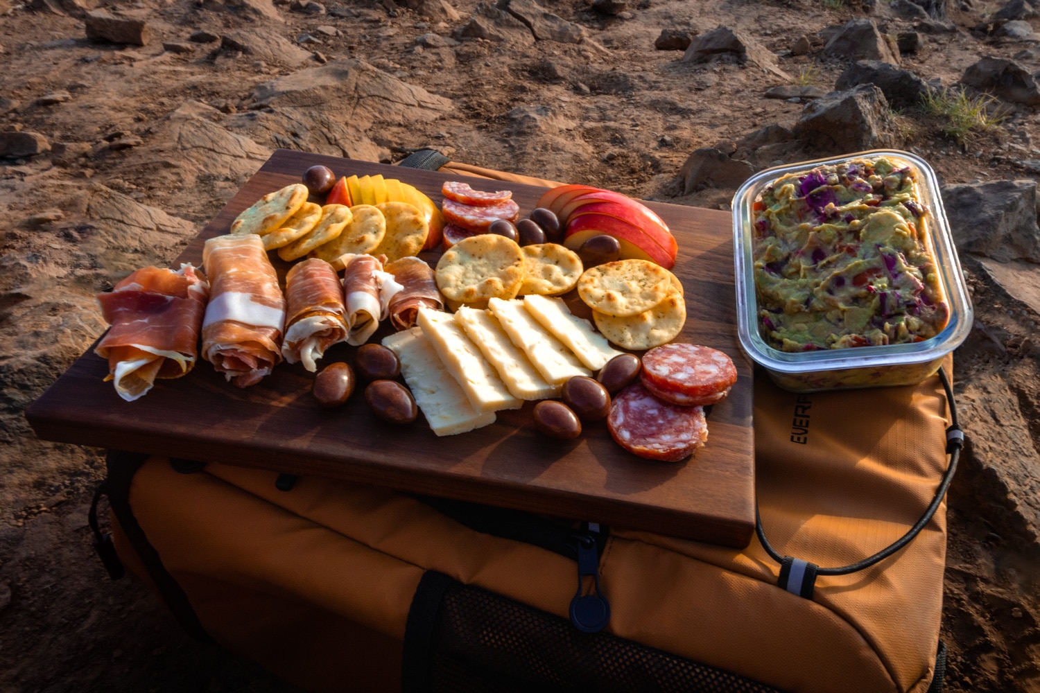 Mountaintop picnic using the EVERFUN cooler backpack as a table.