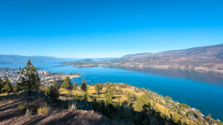 View from the summit of Apex Trail overlooking Knox Mountain, Kelowna, and Okanagan Lake.