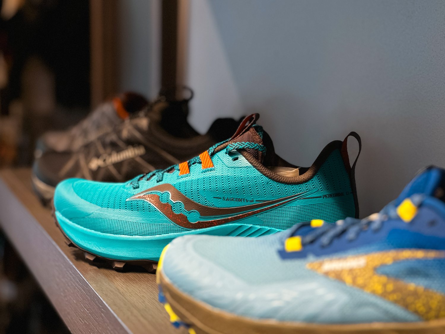 Closeup of trail runners at a Kintec store.
