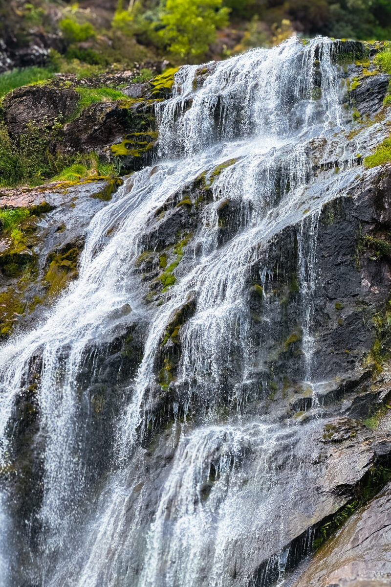 Close up of the water as it falls over the rock.