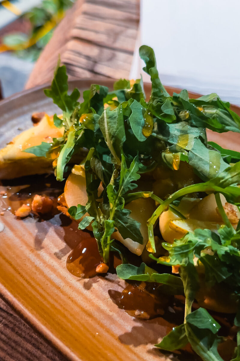 Close up of food with pears and arugula 