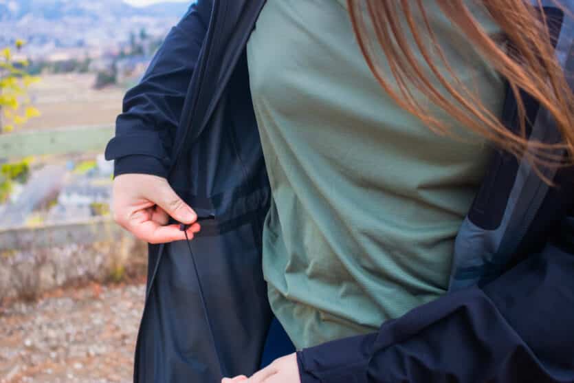 Closeup of the waist cinche on a rain jacket.