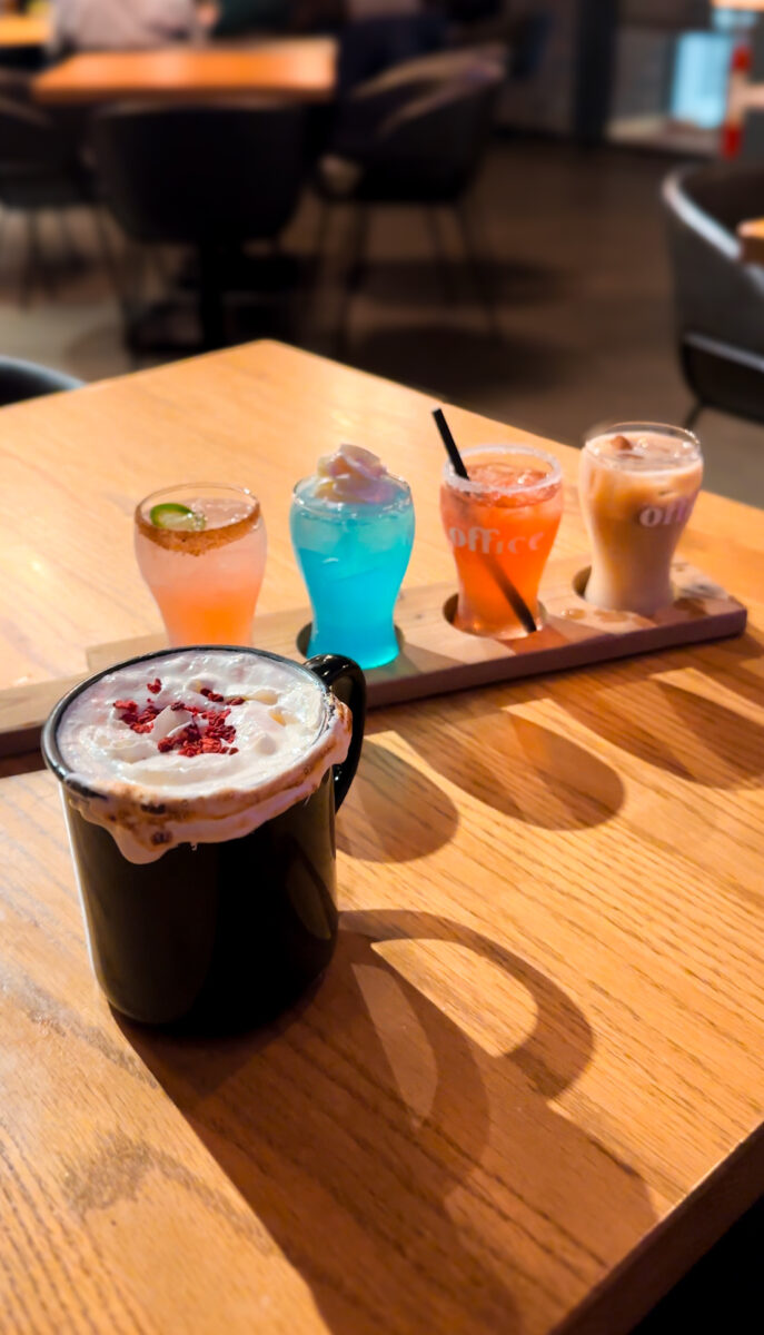 A cocktail flight and hot chocolate from Office Brewing.