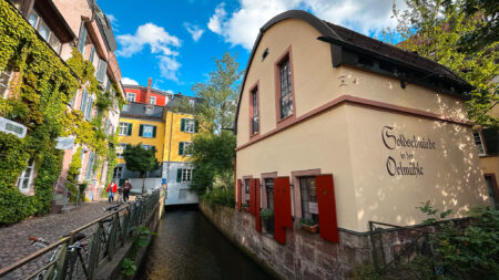 Colourful buildings and a Bächle water channel in Freiburg im Breisgau Old Town